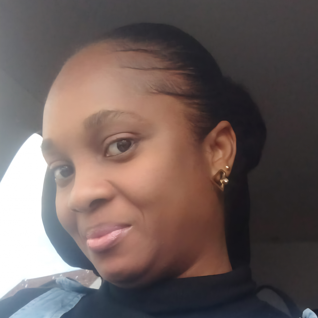 A young black woman with her hair in a bun
